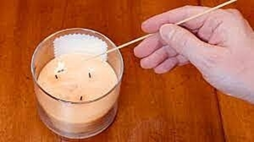 How to light a candle without a lighter